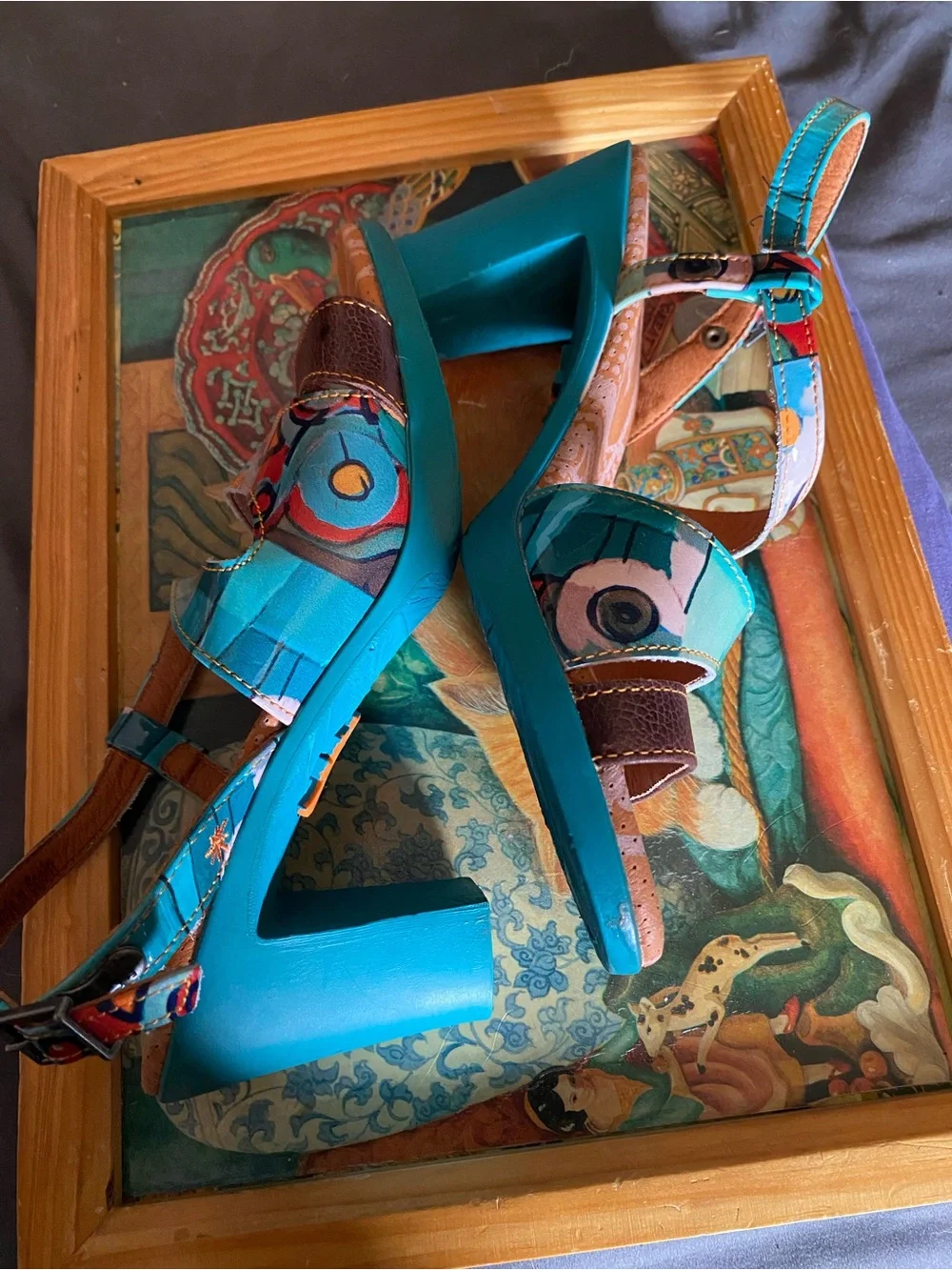 The Art Company, featuring a turquoise and multi-colored abstract pattern